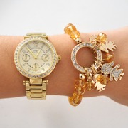 Reloj dorado strass + Pulsera strass niña